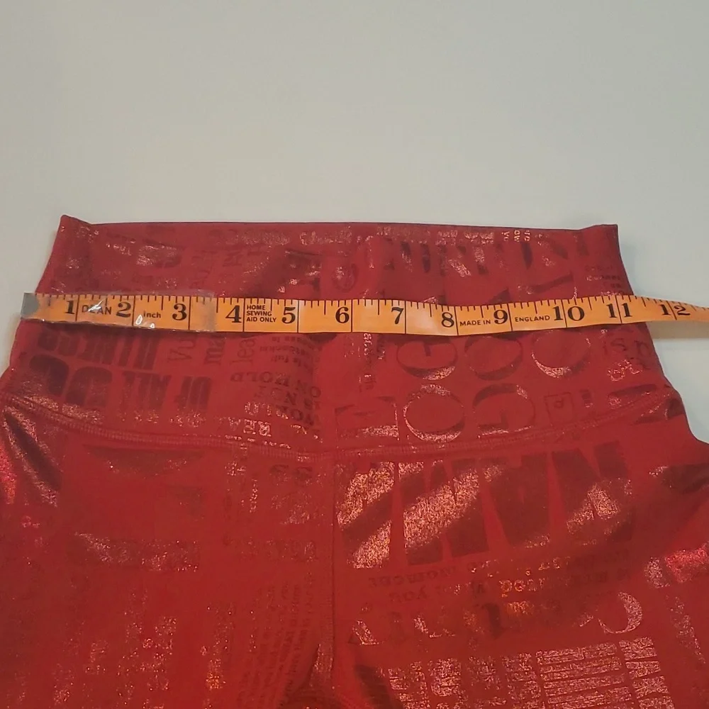#1254 Lululemon red foil manifesto leggings  size 4 b1019.